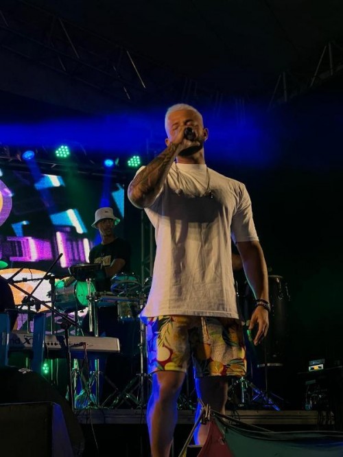 Em